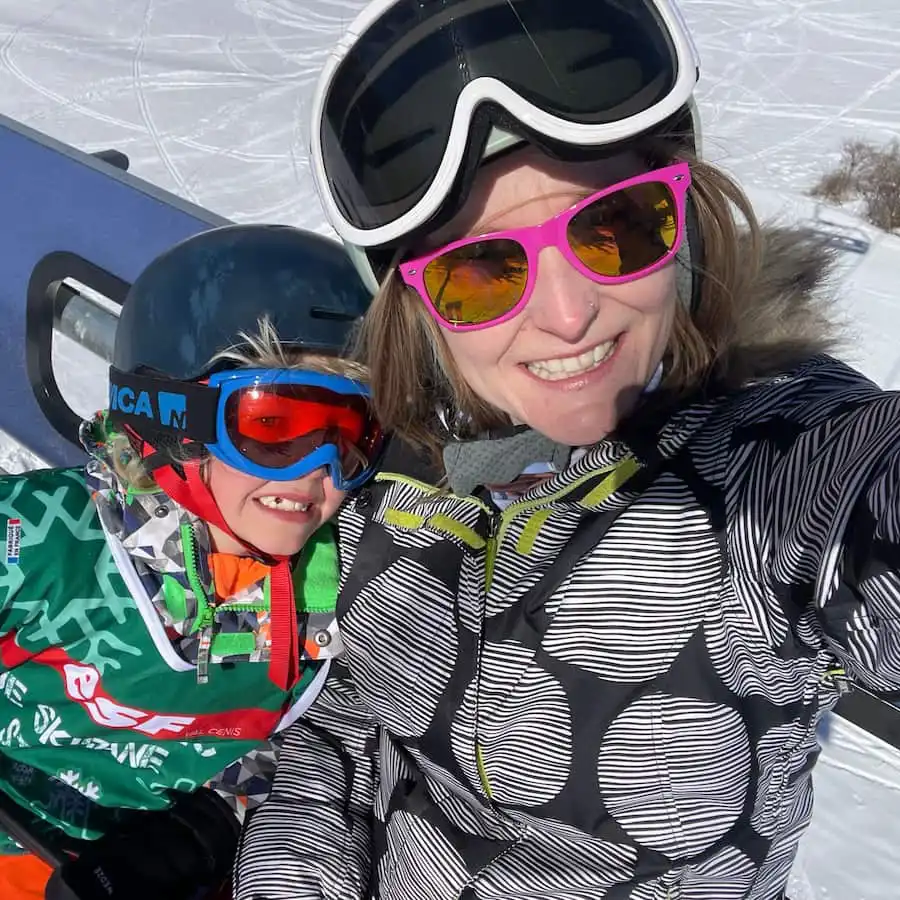 Nicola From The Peak Retreats Team On A Chairlift With Her Son (1)